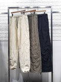 Quilted Padding Jogger Pants: Loose Fit, Drawstring Hem, Nylon Outer, Polyester Inner